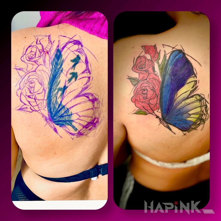 Tattoo Large colorful butterfly as a cover in flowers motif and graphic / illustrative style on the back