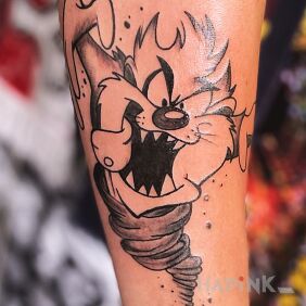 Tattoo Tasmanian Devil on the forearm motif: characters style: graphic / illustrative