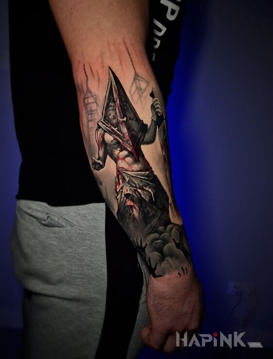 Tattoo Silent Hill Pyramid Head in black and gray motif and realistic style on the forearm