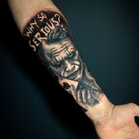 Tattoo Joker with an ace why so serius? on the forearm motif: faces style: realistic