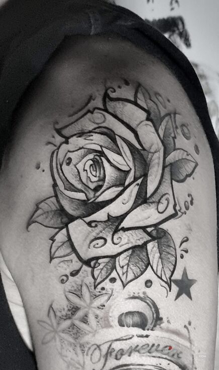 Tattoo Rose in flowers motif and graphic / illustrative style On the arm