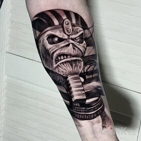 Tattoo Eddie On the arm motif: characters style: graphic / illustrative