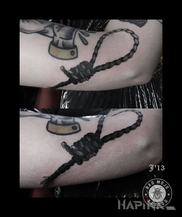 Tattoo Szubienica in objects motif on the upper arm