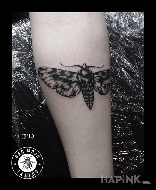 Tattoo Ćma in butterflies motif on the forearm