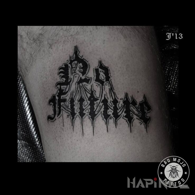 Tattoo No future. in lettering motif on the leg