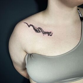 Tattoo Snake along the clavicle on the collarbone motif: animals style: graphic / illustrative