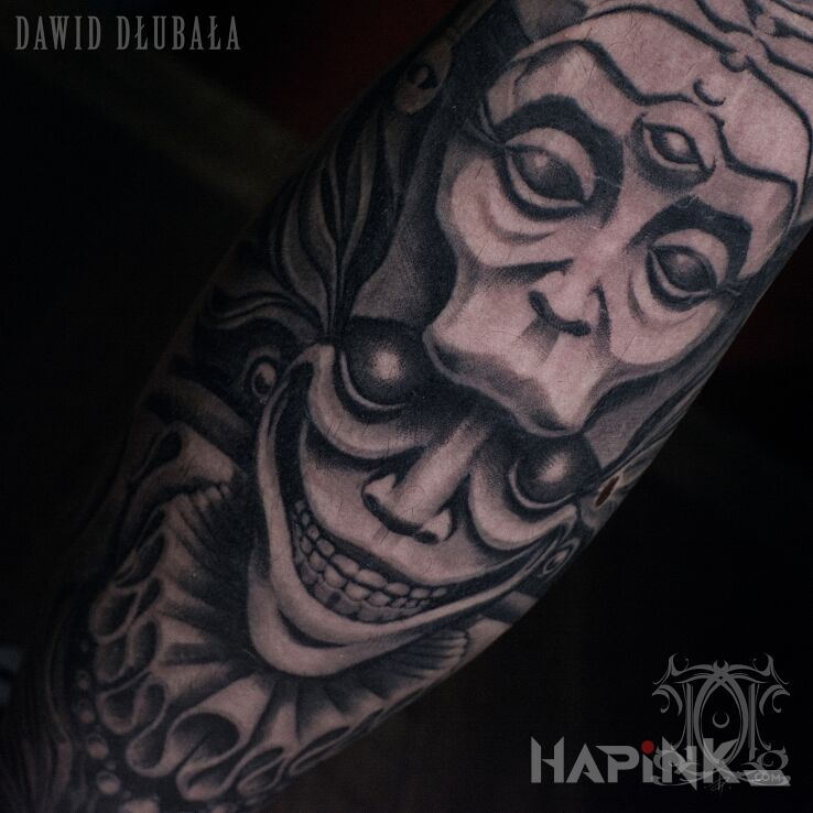 Tattoo Trickster in demons motif and realistic style on the leg