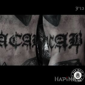 Tattoo Dark writing on the leg motif: lettering