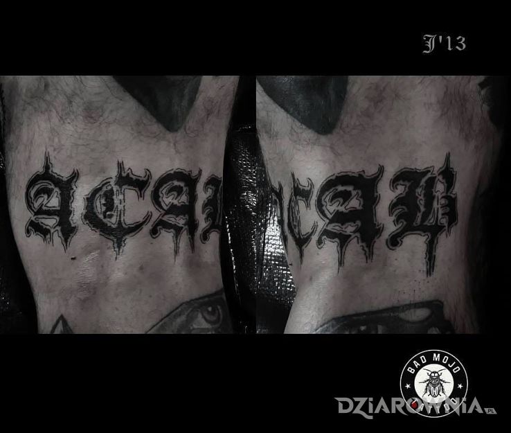 Tatuaż mroczny napis w motywie napisy na nodze