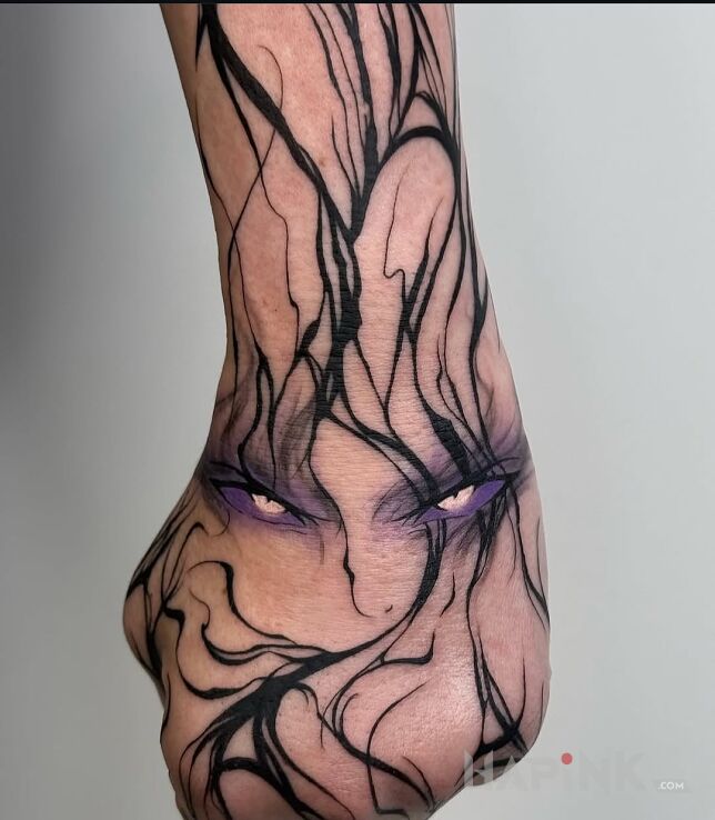 Tattoo Anime eyes in manga / anime motif and graphic / illustrative style on the hand