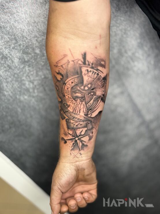 Tattoo Family motif with a clock in objects motif and graphic / illustrative style on the forearm