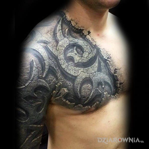 Tatuaż tribal 3d w motywie 3D i stylu tribale na ramieniu