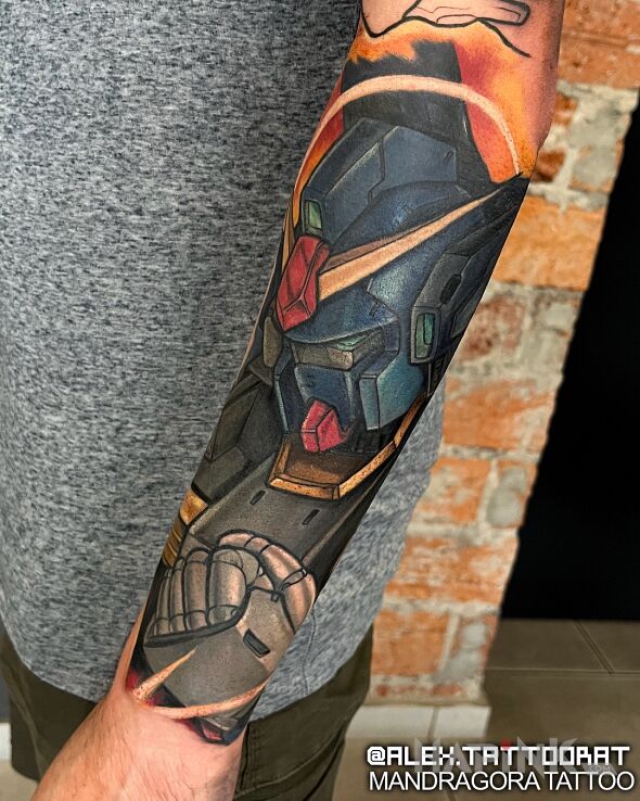 Tattoo Gundam in characters motif and cartoon / comic book style On the arm