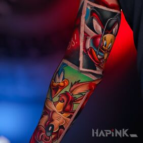 Tattoo Looney Tunes sleeve 2 on the upper arm motif: colorful style: newschool