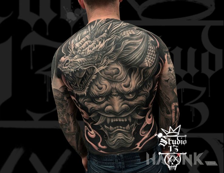 Tattoo Finished back in black and gray motif and realistic style on the shoulder blades