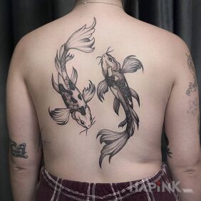 Tattoo Two big fish on the back motif: animals style: graphic / illustrative