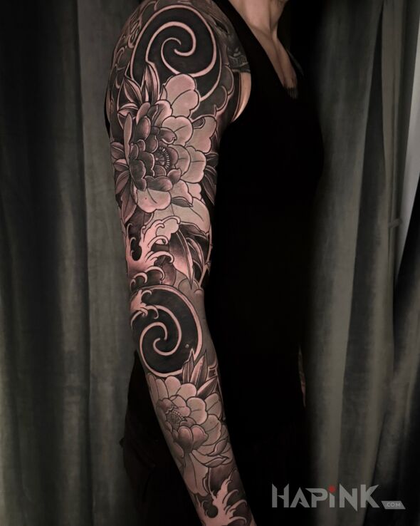 Tattoo Japanese style sleeve from DEMOLKA in fantasy motif and japanese / irezumi style on the forearm