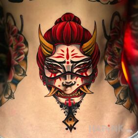 Tattoo Japanese demon on the stomach motif: faces style: newschool