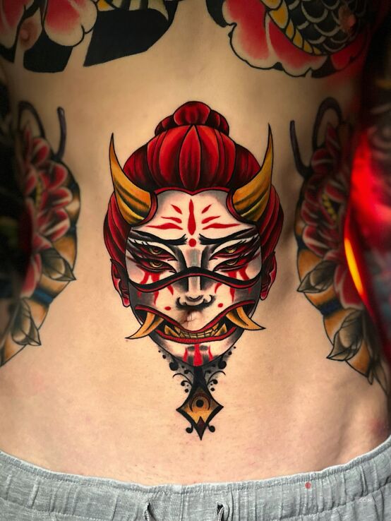 Tattoo OLDSCHOOL from Eveline Pearl Ink in demons motif and newschool style on the stomach
