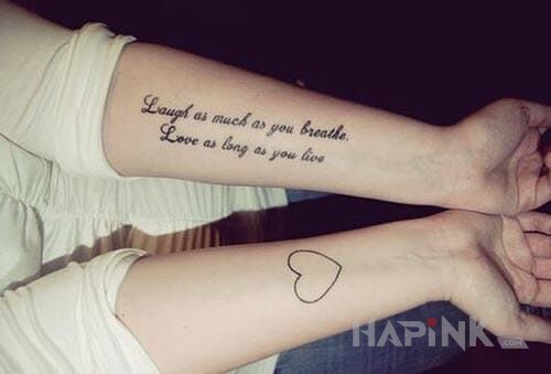 Tattoo Napis od serca in lettering motif on the forearm