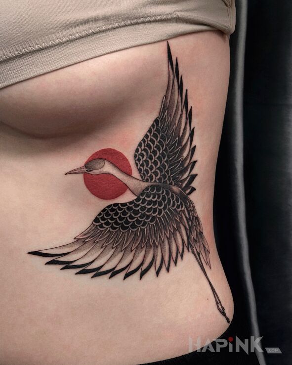Tattoo Punch from Jasno Tattoo in animals motif and graphic / illustrative style on the ribs