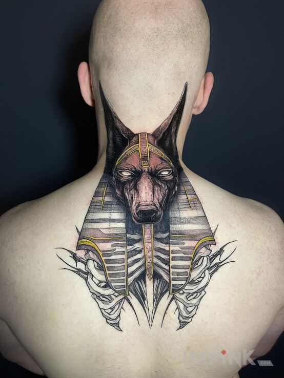 Tattoo Anubis neck back in characters motif and graphic / illustrative style on the back