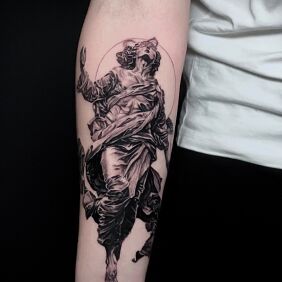 Tattoo Mary the angel on the forearm motif: black and gray style: realistic