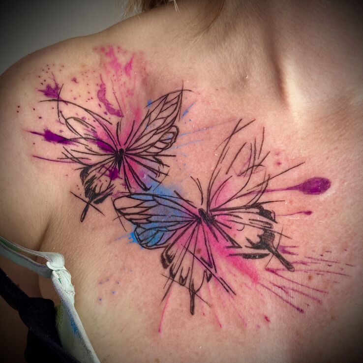 Tattoo Watercolor butterflies in butterflies motif and Watercolor style on the collarbone
