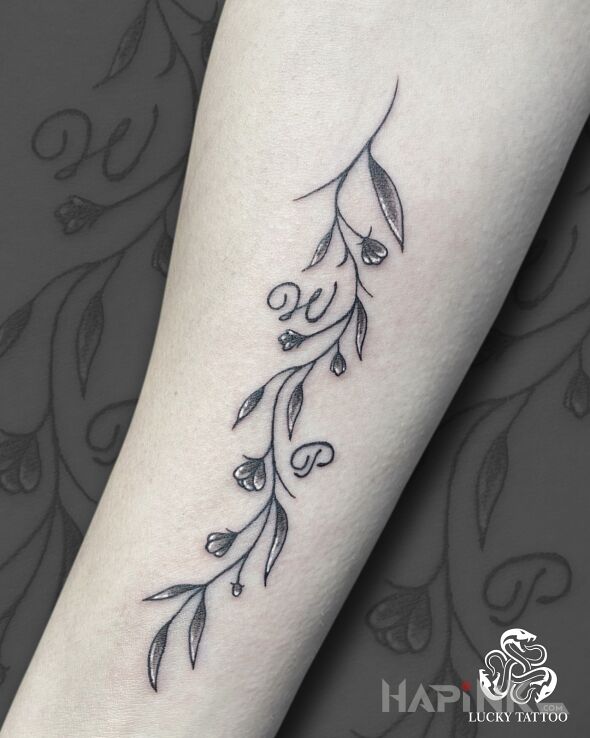Tattoo Sometimes the smallest things matter most 🌿❤️ in flowers motif and calligraphy style On the arm