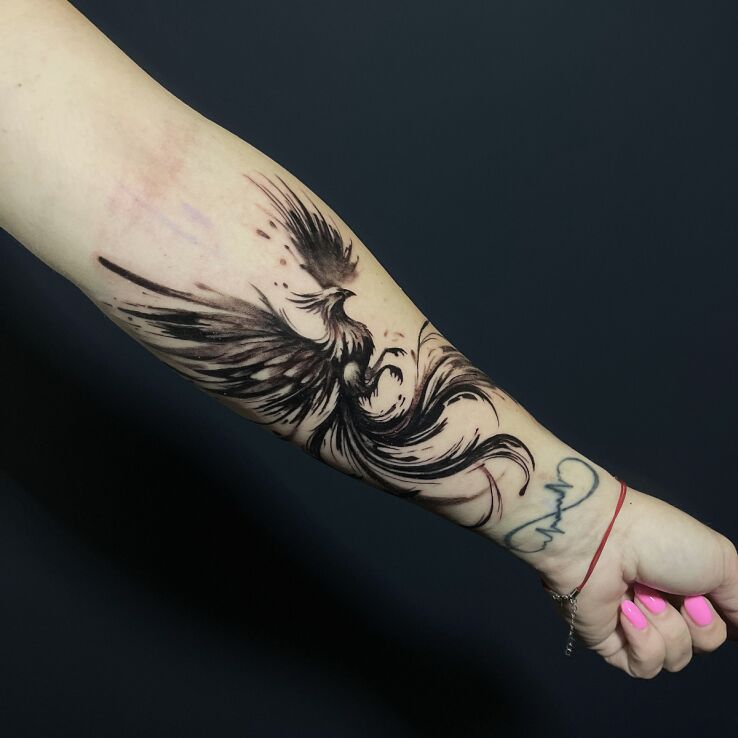Tattoo Phoenix forearm in animals motif and graphic / illustrative style On the arm