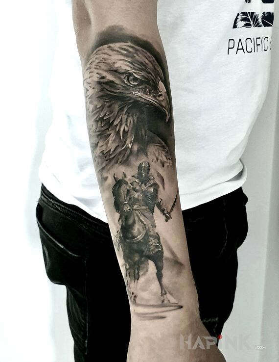 Tattoo Eagle and warrior in animals motif and realistic style On the arm
