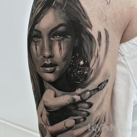 Tattoo Infernal goddess On the arm motif: dark style: realistic
