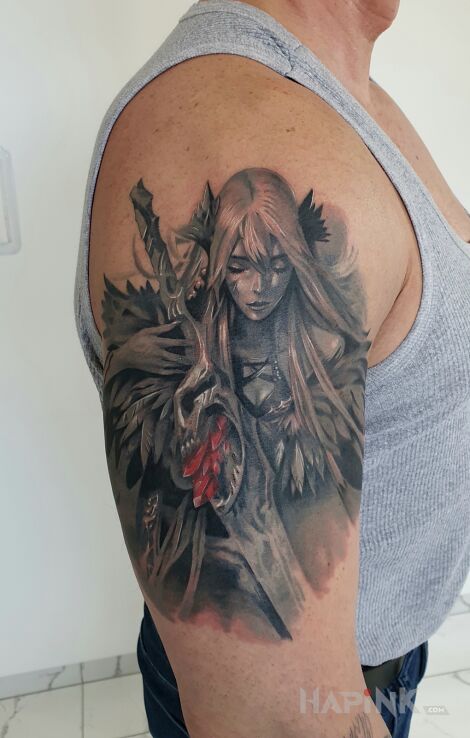 Tattoo Witch in black and gray motif and realistic style on the upper arm