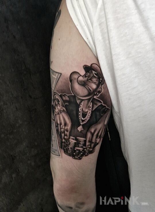 Tattoo Gangster Popeye in funny motif and cartoon / comic book style on the upper arm