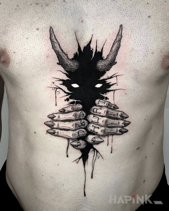Tattoo Devil inside you in demons motif and blackwork / blackout style on the stomach