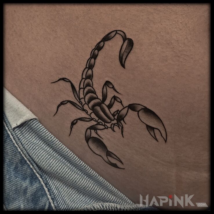 Tattoo Scorpion on the belly in zodiac signs motif and oldschool style on the stomach