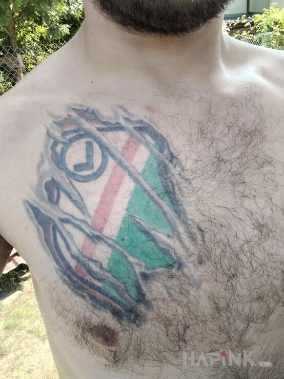 Tattoo Legia Warsaw 👆 in colorful motif and realistic style on the chest