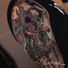 Tattoo Death is coming for you on the upper arm motif: dark style: realistic