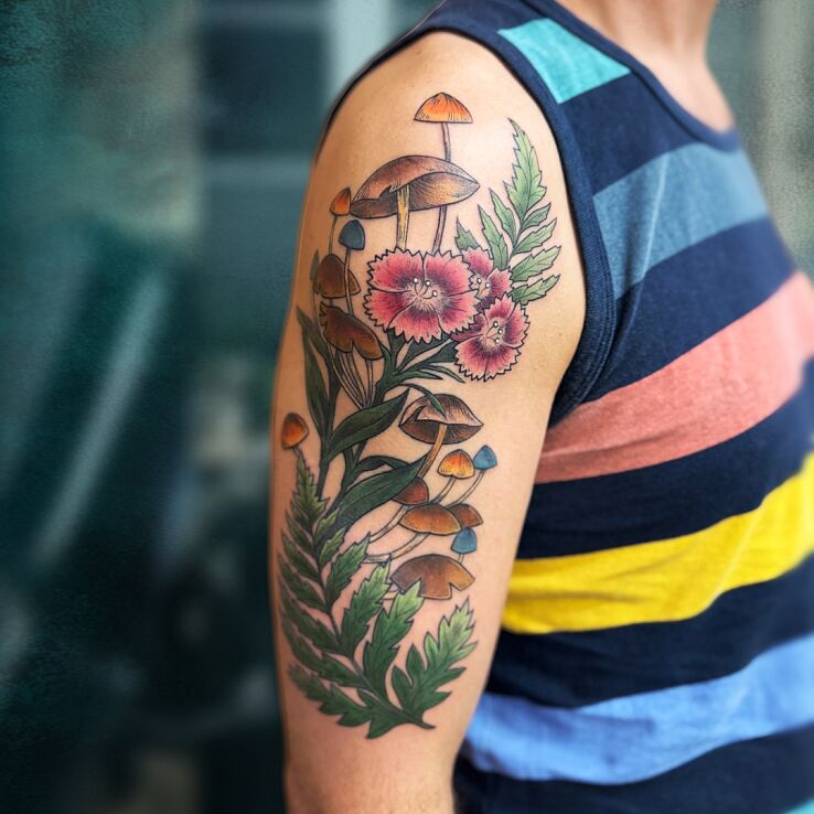 Tattoo 🌀🍄 Tattoo or travel? 🍄🌀 in floral motif and neo-traditional style On the arm