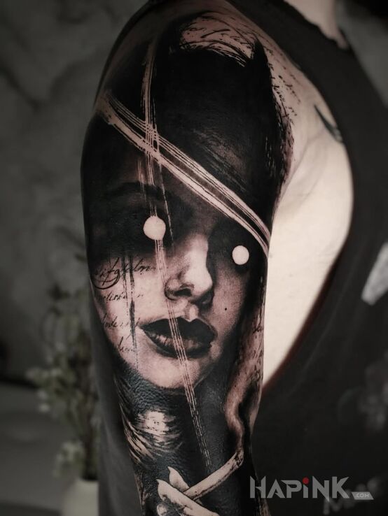 Tattoo Empty blinders in dark motif and realistic style on the upper arm