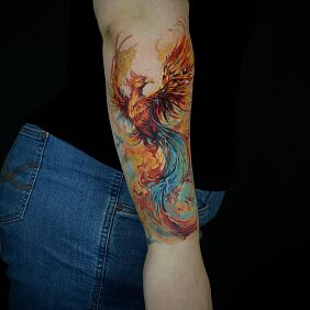 Tattoo Phoenix color forearm on the forearm motif: animals style: realistic