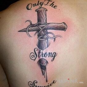 Tattoo Only the strong survive on the shoulder blades motif: lettering