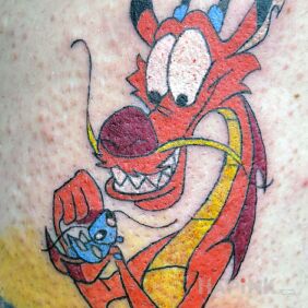 Tattoo Mushu on the thigh motif: dragons style: cartoon / comic book