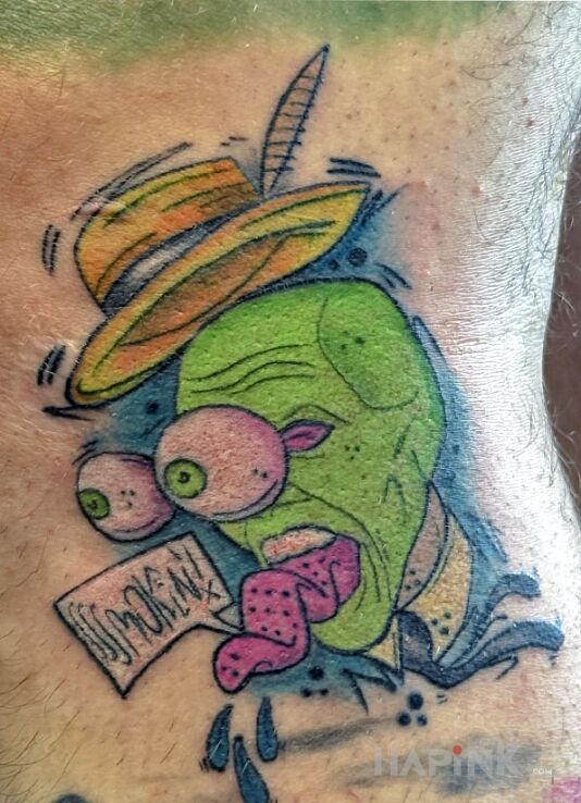 Tattoo Mask in characters motif and graphic / illustrative style on the knee