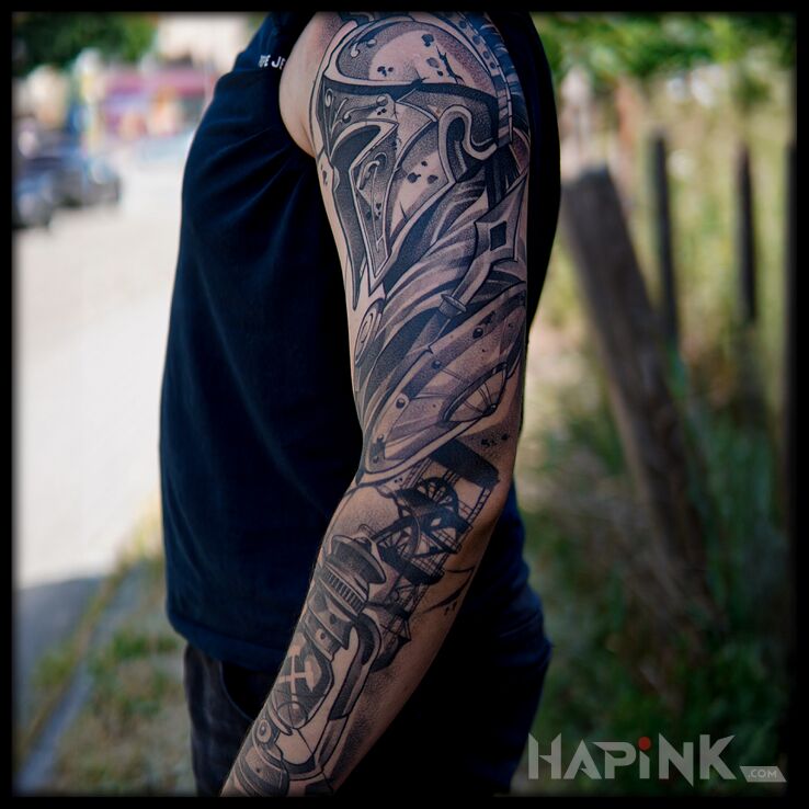 Tattoo Spartan and miner's lamp in characters motif and realistic style on the forearm