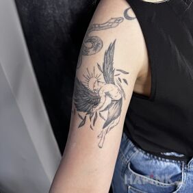 Tattoo Angel on the bicep motif: black and gray style: graphic / illustrative