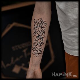 Tattoo Get rich or die tryin' On the arm motif: black and gray style: calligraphy