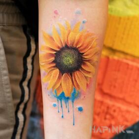 Tattoo Sunflower on the forearm motif: colorful style: realistic