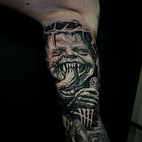 Tattoo Dark hand On the arm motif: black and gray style: realistic