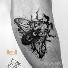 Tattoo Moth on the bicep motif: animals style: sketch